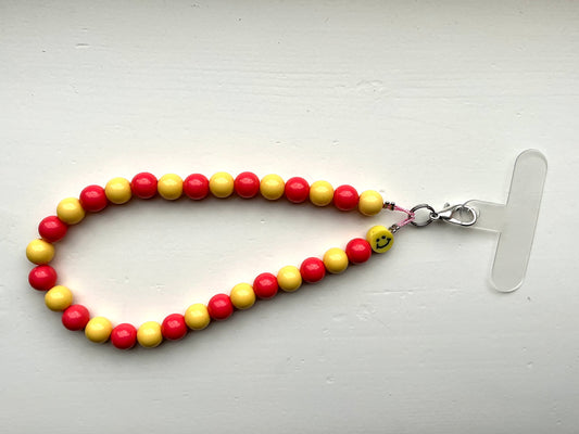 Gekleurde kralen telefoonkoord geel/rood
