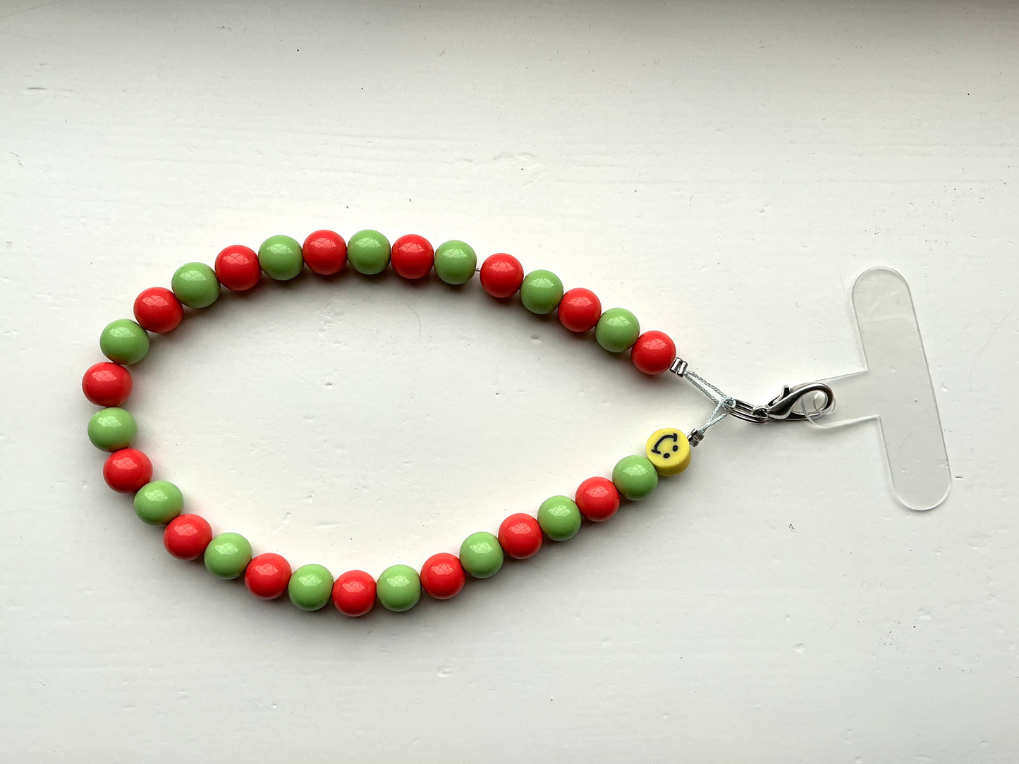 Gekleurde kralen telefoonkoord rood/groen