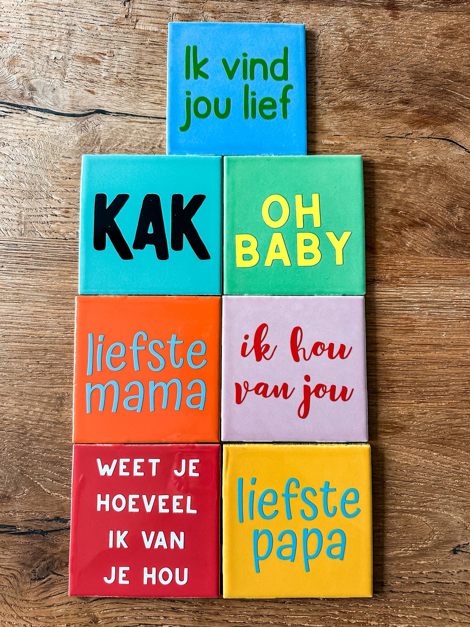 verschillende voorbeelden tegeltjes met tekst