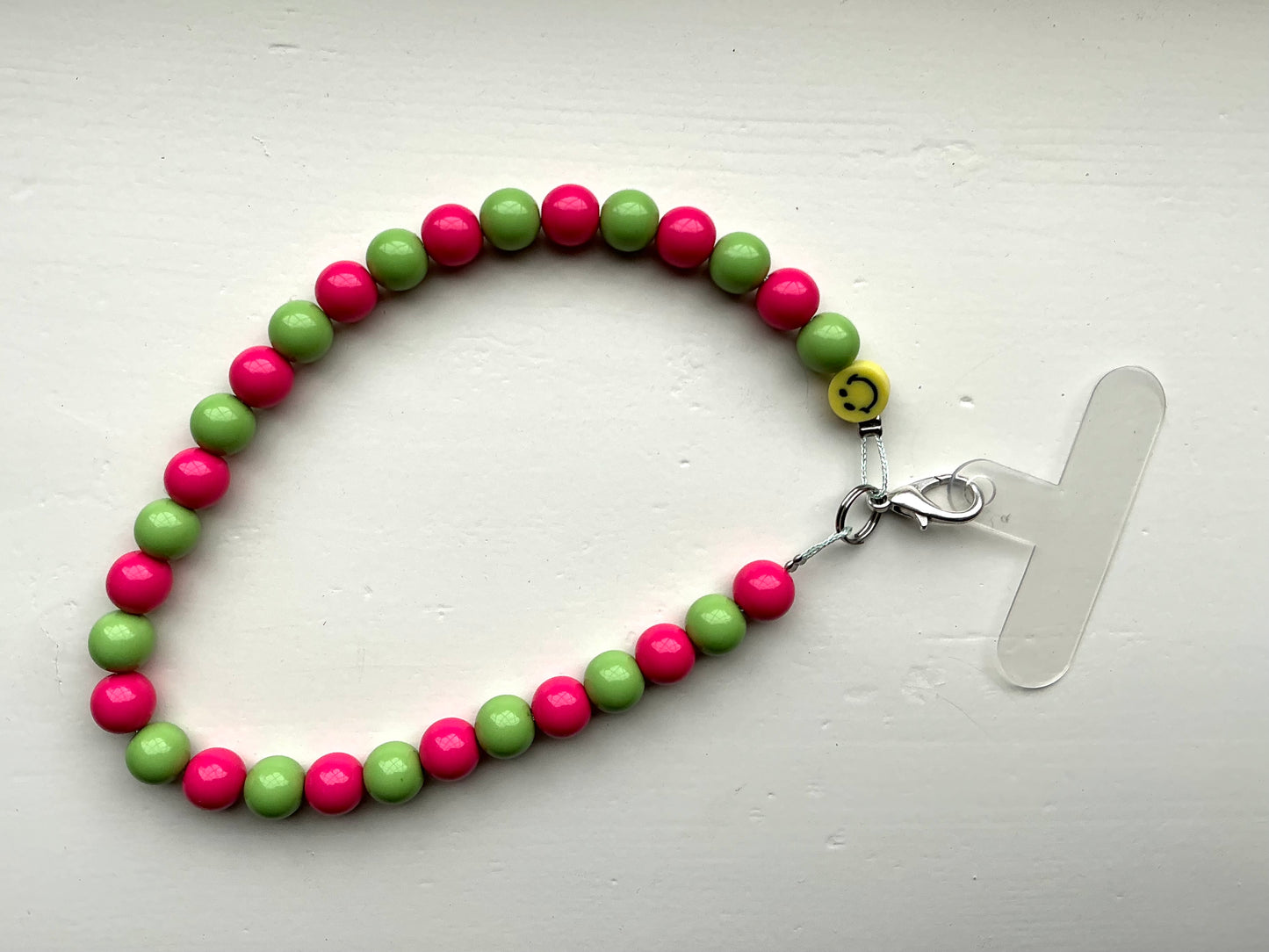 Gekleurde kralen telefoonkoord groen/roze