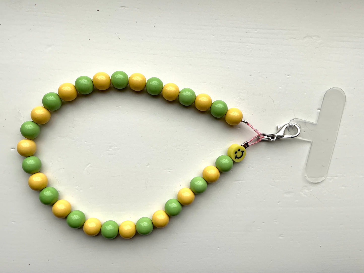 Gekleurde kralen telefoonkoord geel/groen