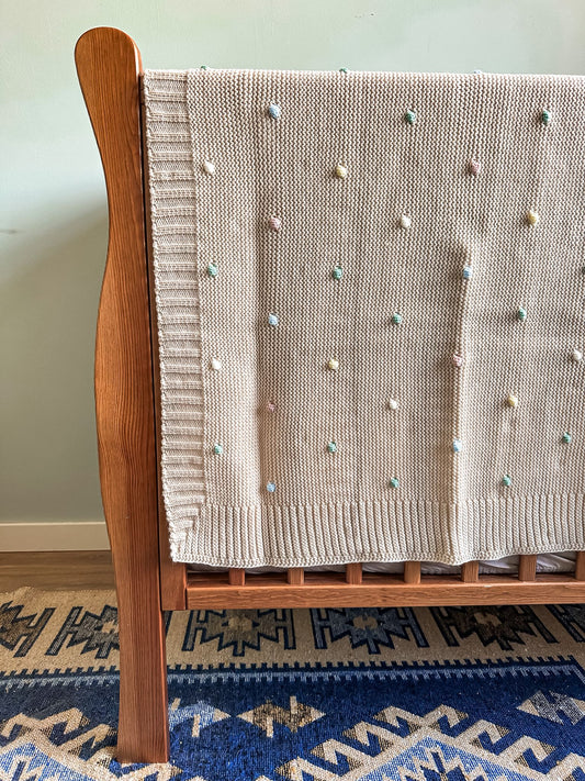 babydeken beige met gekleurde balletjes, zacht